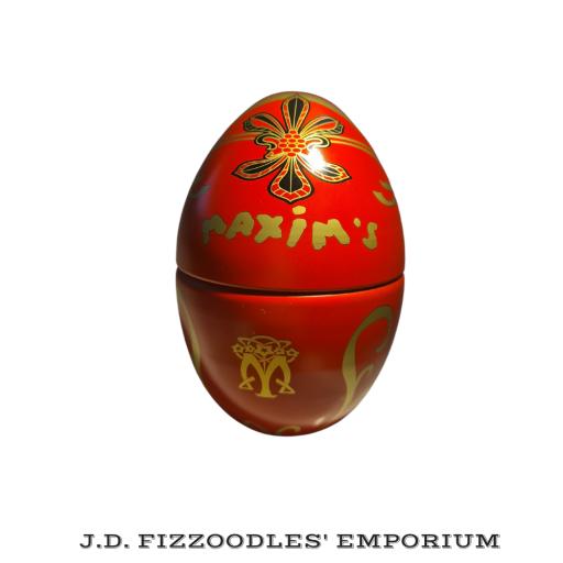 Maxim's of Paris Egg Shaped Tin red